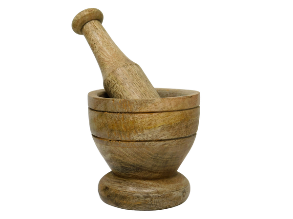 Wooden mortar and pestle on a white background