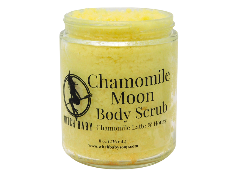 A clear glass jar with a label that reads 'Chamomile Moon Body Scrub' containing a yellow body scrub.