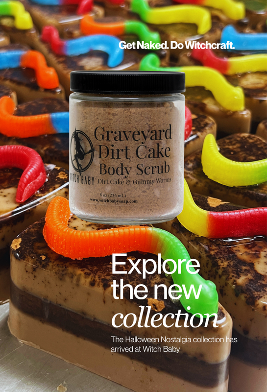 A jar of Witch Baby Graveyard Dirt Cake Body Scrub is centered in front of Halloween-themed soap decorated with colorful soapy gummy worms. White text at the top reads 'Get Naked. Do witchcraft. Explore the new collection. The Halloween Nostalgia collection has arrived at witch baby