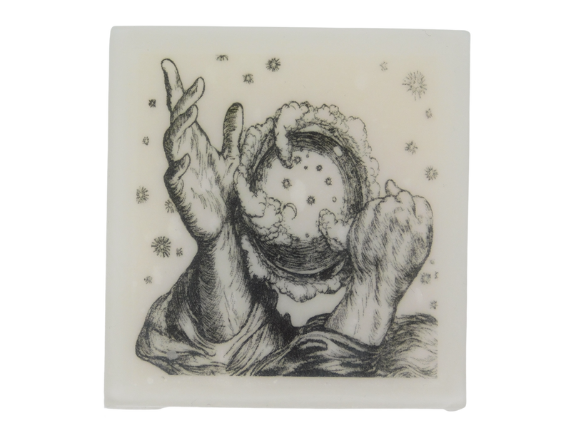 square shaped soap with a vintage illustration of two hands conjuring the universe